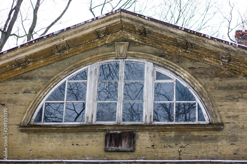 Amazing view of white window on an old wood house.