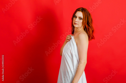 Captivating Nude Portrait of a Woman on Red Background - Embracing Cosmetology, Care, Women's Health, and Sexuality © romankrykh