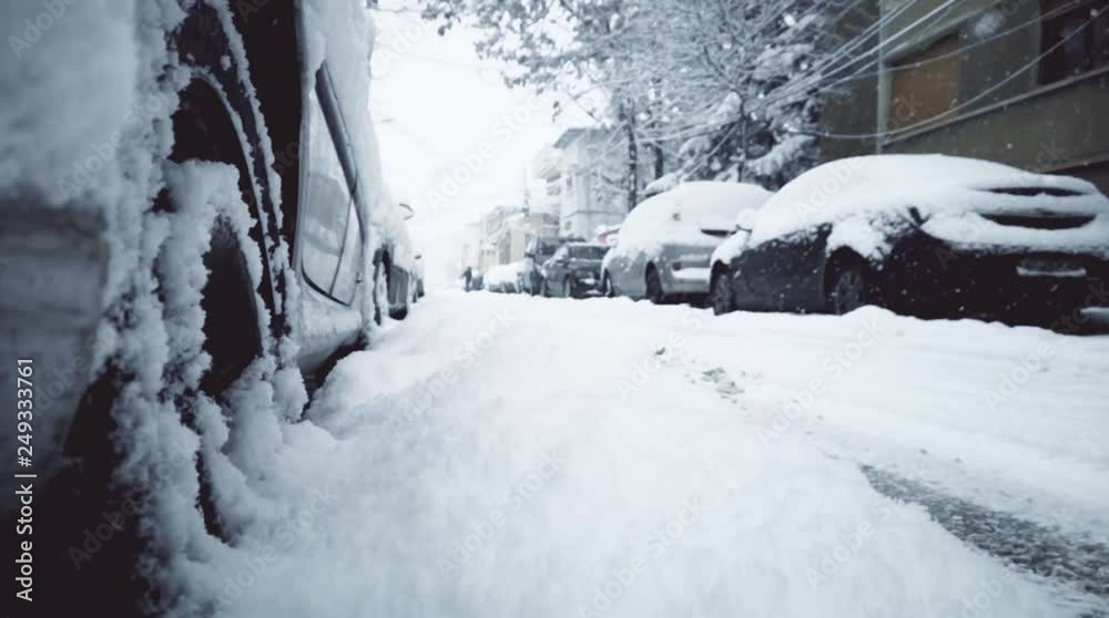 custom made wallpaper toronto digitalSlow motion clip with snowfall on a street with parked cars