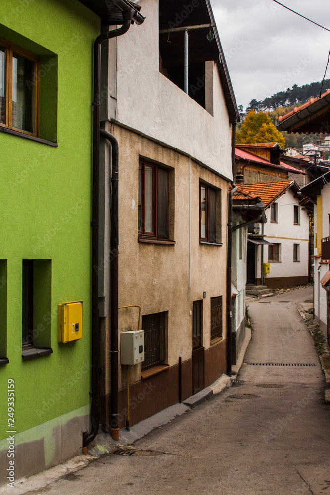 Narrow street in the historic district of Sarajevo in autumn. Bosnia and Herzegovina