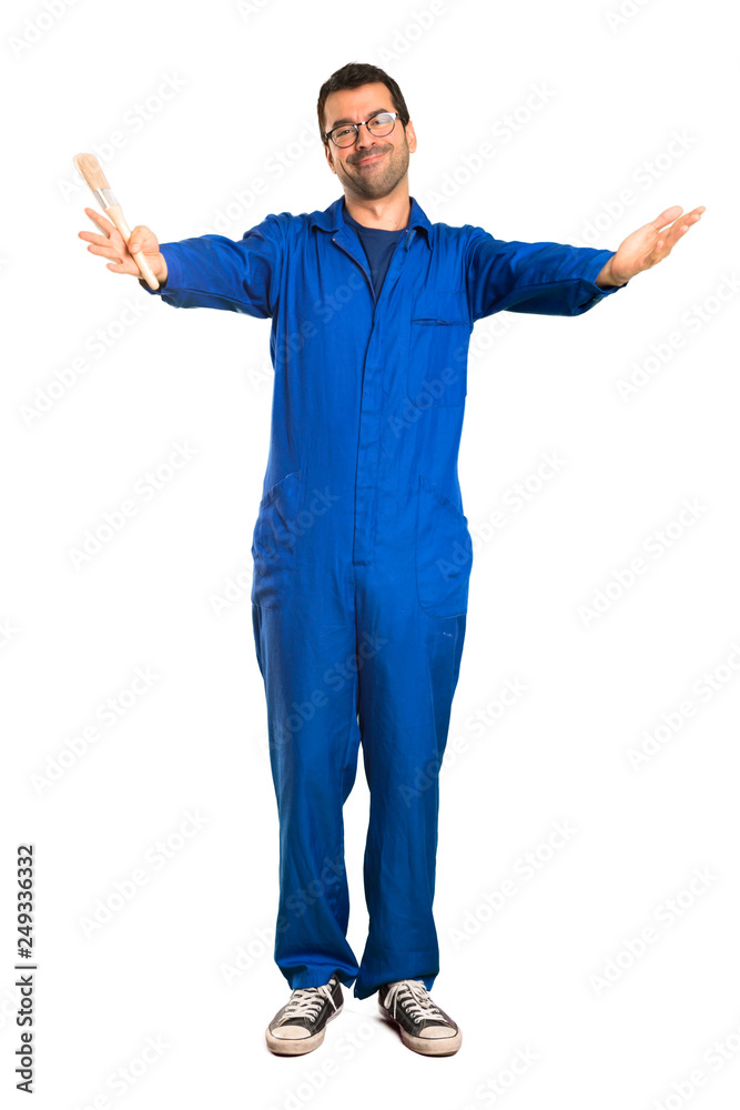 A full-length shot of a Painter man presenting and inviting to come with hand on isolated white background A full-length shot of a Painter man presenting and inviting to come with hand on isolated white background