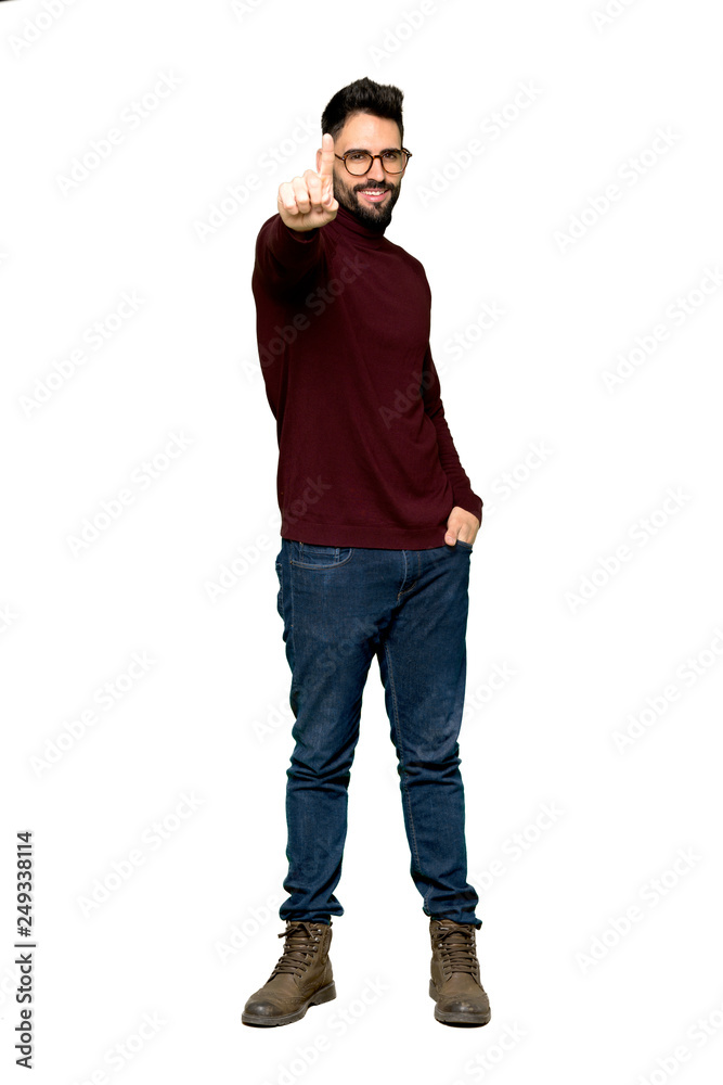 Full-length shot of Handsome man with glasses showing and lifting a finger on isolated white background Full-length shot of Handsome man with glasses showing and lifting a finger on isolated white background