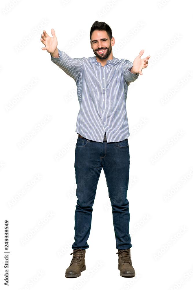 Full-length shot of Elegant man with shirt presenting and inviting to come with hand on isolated white background Full-length shot of Elegant man with shirt presenting and inviting to come with hand on isolated white background