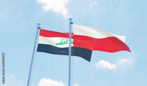 Poland and Iraq, two flags waving against blue sky. 3d image