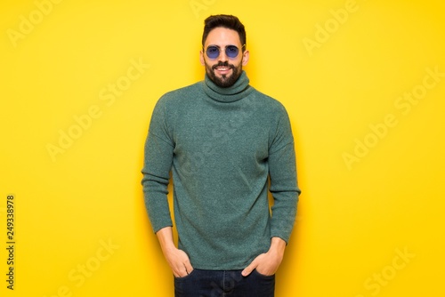 Handsome man with sunglasses with glasses and happy