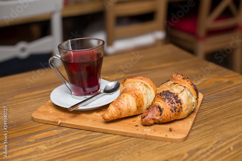 Cup of tea and croissants