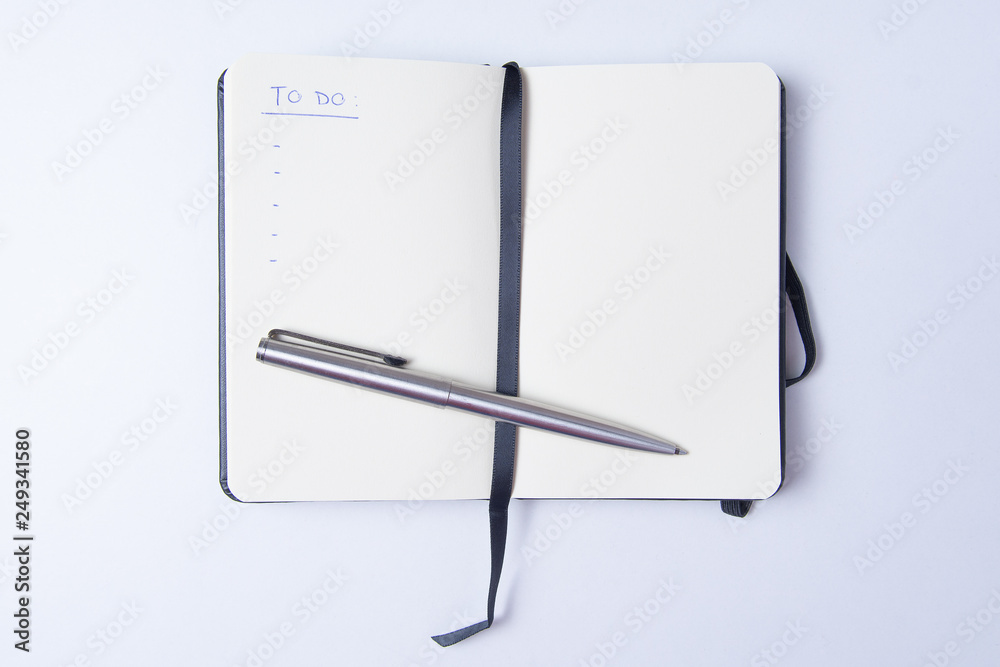 blank notepad on white table ready to write blank notepad on white table ready to write