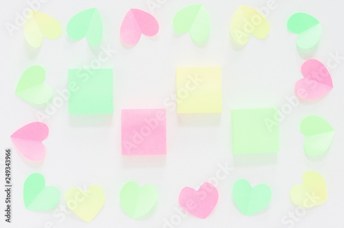 paper heart love pastel colorful minimal style frame background top view flat lay paper origami handcraft with blank sticky note for design valentines day concept.