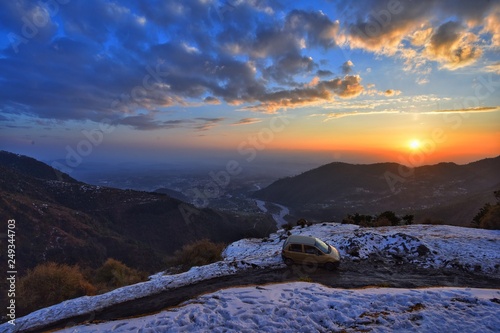 The sunset with snow cover and the wide view of palampur the city photo