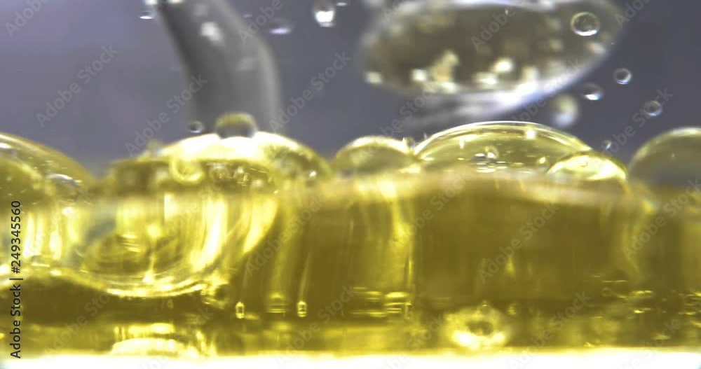 Experiments on Different reactions of bubbles in oil, Different colors of bubbles. Concept of: Colors, Red, Yellow, White, Blue, Green, Different size, Different bubbles, Very Close. Experiments on Different reactions of bubbles in oil, Different colors of bubbles. Concept of: Colors, Red, Yellow, White, Blue, Green, Different size, Different bubbles, Very Close.