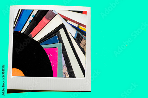 Instant photo on colored blue soft background.