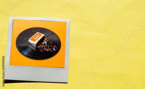 Instant photo on colored yellow background