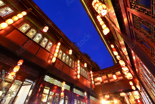 Red lanterns are hung in the attic in the ancient town at night, in Chengdu, Sichuan, China. © onlyyouqj