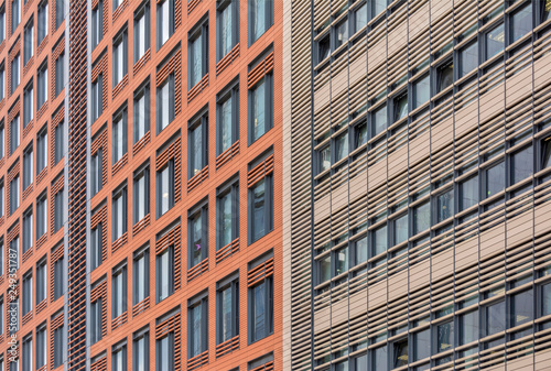 Office building made of metal panels with large Windows.