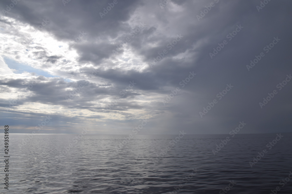 The Sea in a grey overcast day with a view of the horizon