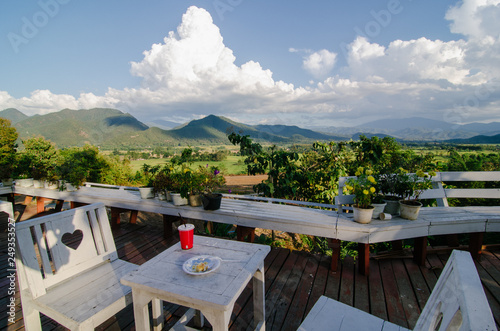 White table with beautiful views on the mountain.