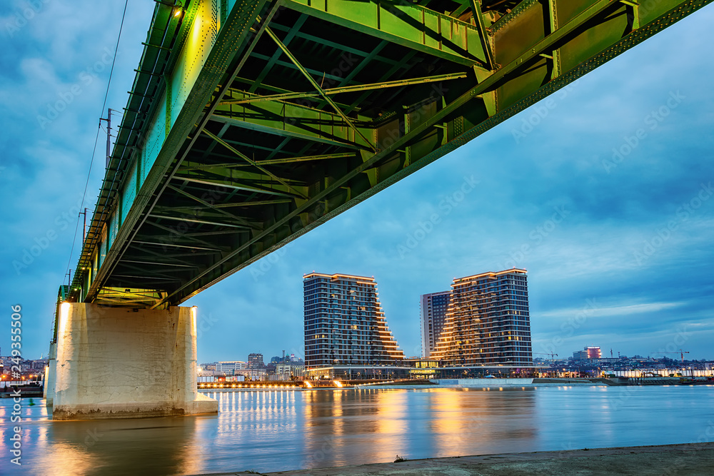 Fototapeta premium Belgrade, Serbia - February 10, 2019: A panorama of Belgrade seen from the banks of the Sava River. Old bridge and waterfront of Belgrade.