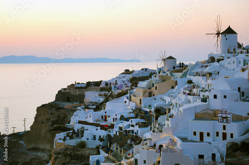 Fabulous picturesque village of Oia in Santorini island at sunset, Greece