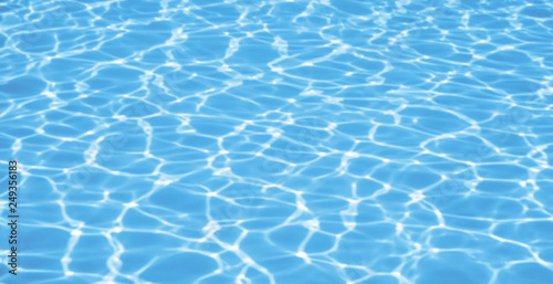 Blue ripped water in swimming pool background
