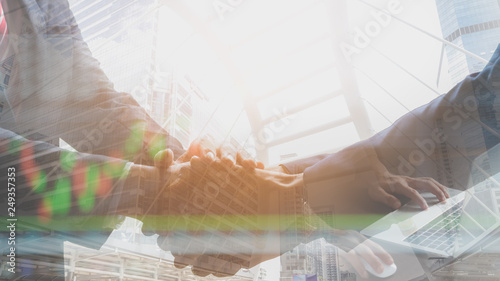 double exposure handshake and holding together business man successful partnership. financial business concept.