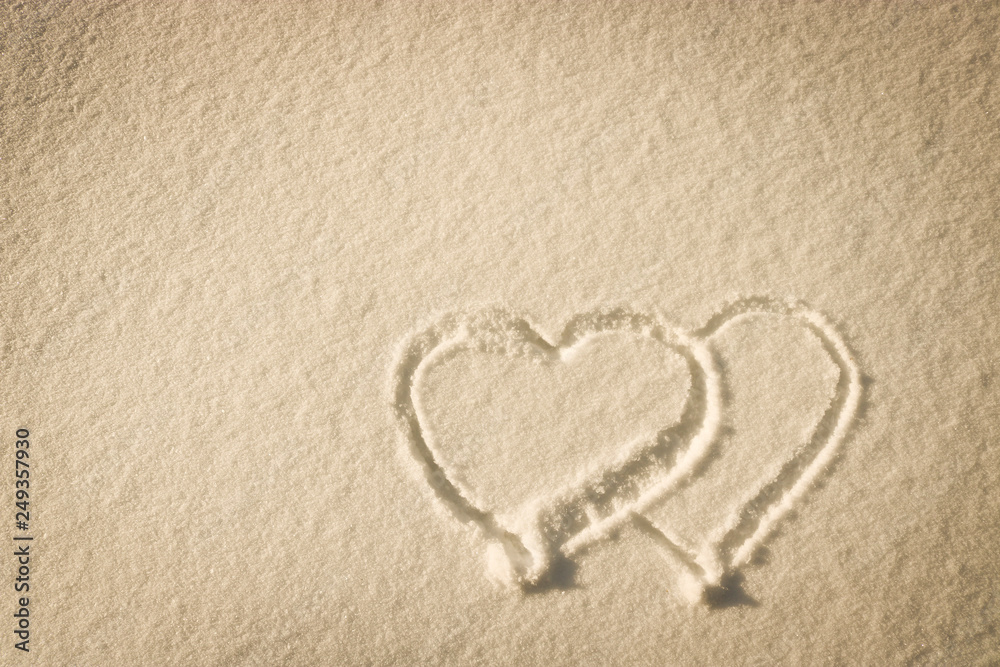 Heart drawn on the snow - composition with copy space, lettering template, text, design. Postcard template. The concept of the holiday. Heart drawn on the snow - composition with copy space, lettering template, text, design. Postcard template. The concept of the holiday.