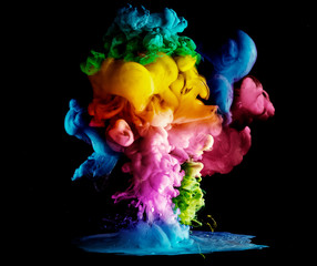 Acrylic colors and ink in water. paint on a black background, the best photo
