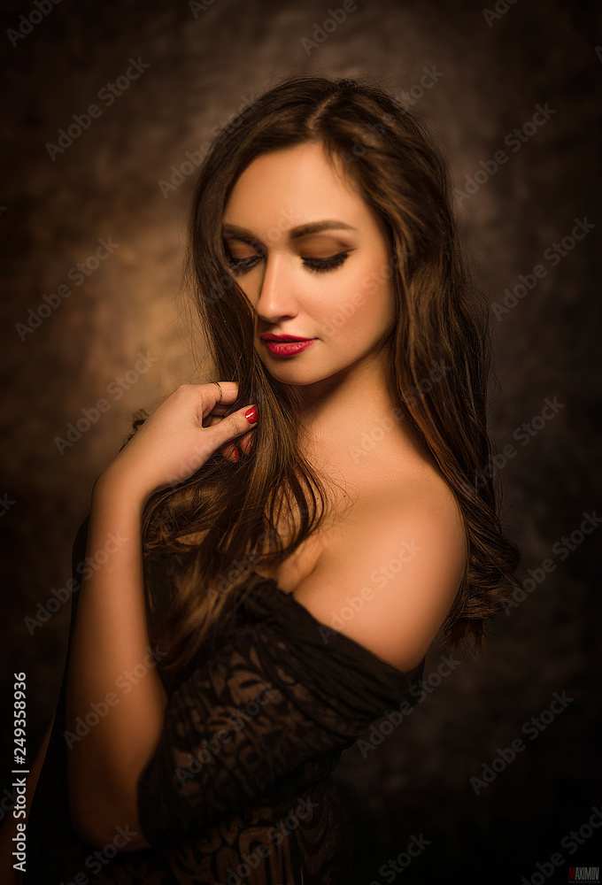 portrait of a young girl on a paper background