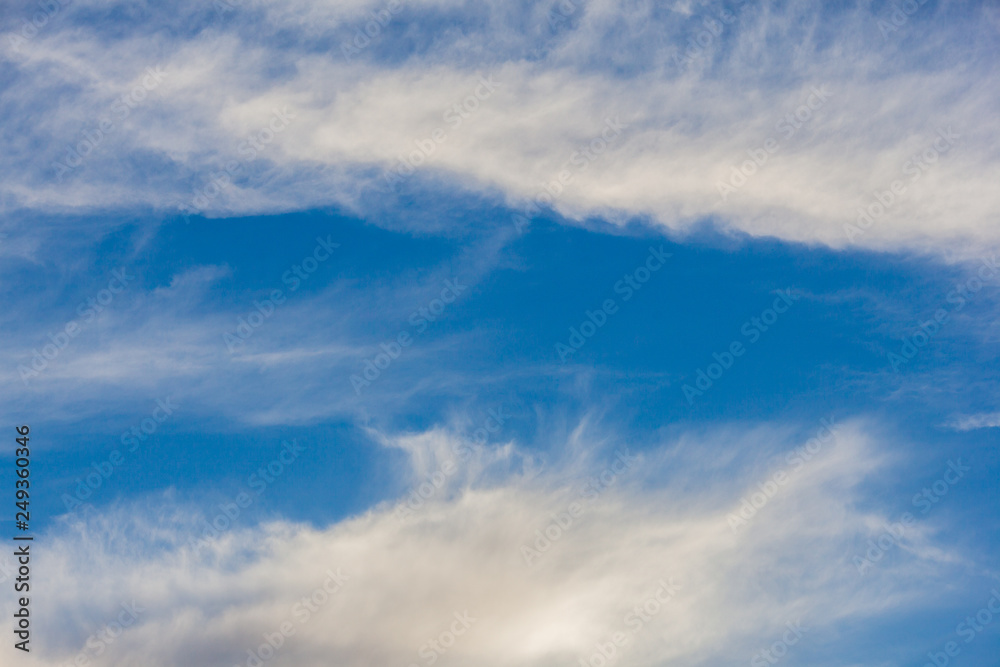 white clouds in the blue sky, clear weather, Sunny day. for the background, design, copy space