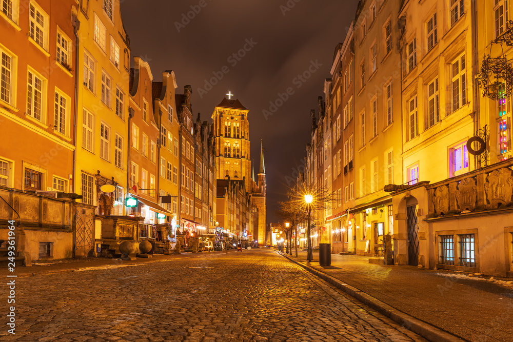 Piwna street and view on the St Mary's Basilica Tower in Gdansk, Poland, evening, no people