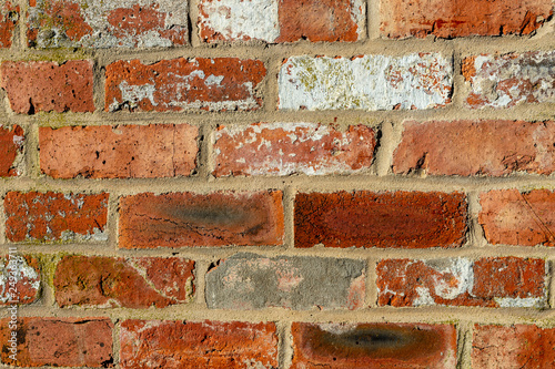 close up of a brick wall that has been build with old bricks