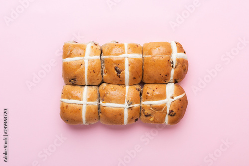Wallpaper Mural Six hot cross buns, traditional British Easter food on pink background, top view, selective focus Torontodigital.ca