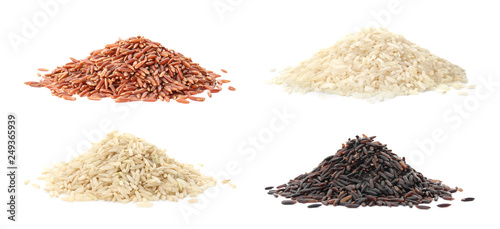 Fototapeta Naklejka Na Ścianę i Meble -  Set with piles of different uncooked rices on white background