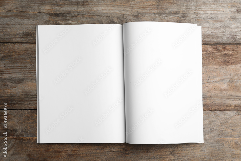 Mockup of open brochure on wooden background, top view Mockup of open brochure on wooden background, top view