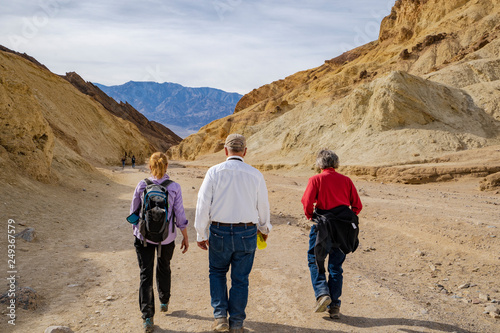 Senior adults hiking in the Golden Canyon of Death Valley