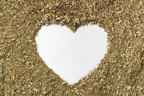 Background from Paraguayan yerba mate with heart in the center