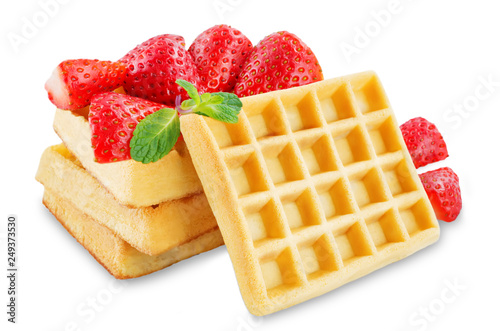 Waffeles berries and mint leaf on a white background