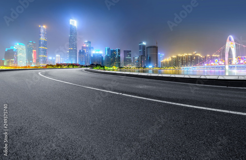 The expressway and the modern city skyline are in guangzhou  China.