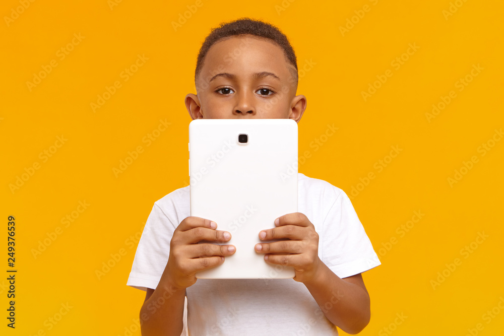 Kids with gadgets. Little persons holding smartphones and tablet using By  ONYX
