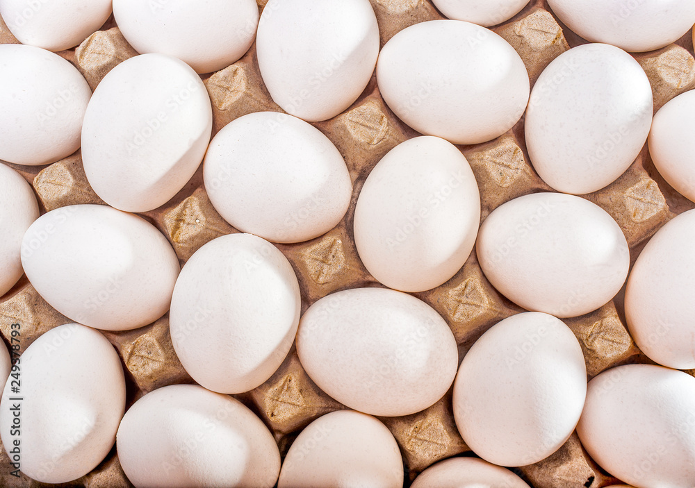 Eggs in a container arranged in opposition to each other. Eggs in a container arranged in opposition to each other.