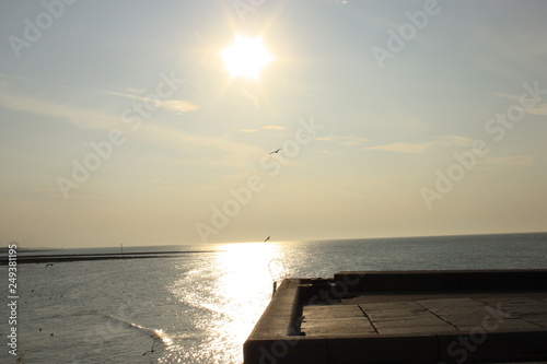 sun over the beach