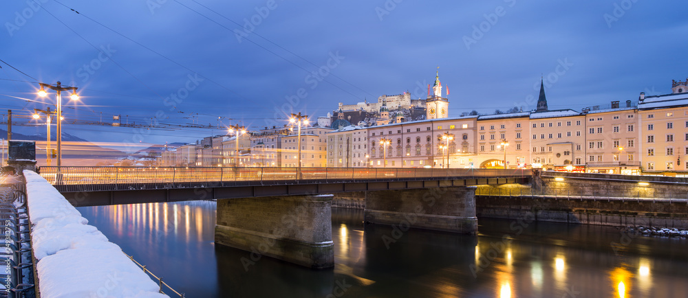 wide angle panoramic view to bridge and river in twilight time in Salzburg in Austria