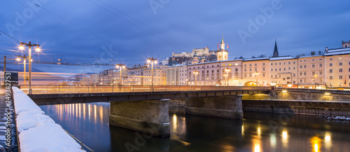 wide angle panoramic view to bridge and river in twilight time in Salzburg in Austria