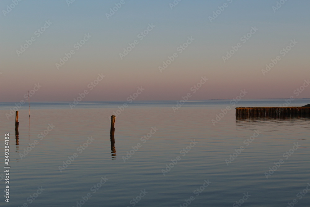 the North Sea, dipped in the evening sun in pastel colors