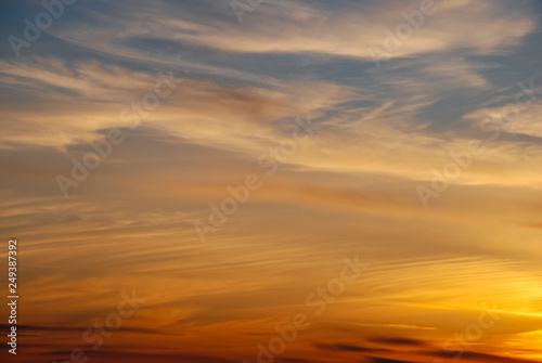 Beautiful sunset with a sun and clouds 