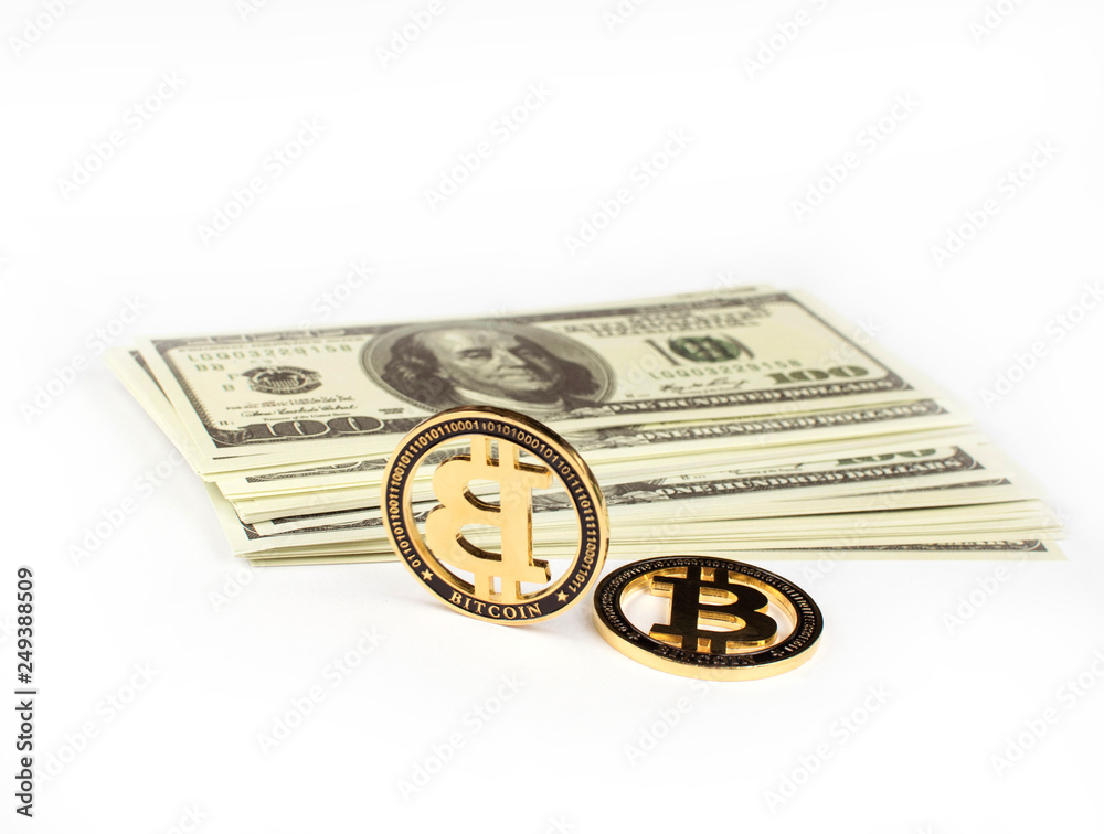 Dollars paper and coins bitcoins are located on a white background Dollars paper and coins bitcoins are located on a white background