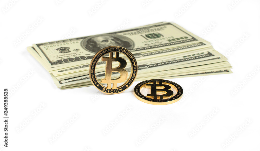 Dollars paper and coins bitcoins are located on a white background Dollars paper and coins bitcoins are located on a white background