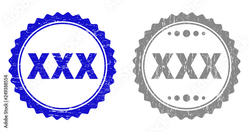 Grunge XXX stamp seals isolated on a white background. Rosette seals with grunge texture in blue and gray colors. Vector rubber stamp imitation of XXX caption inside round rosette.