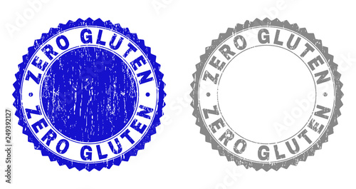 Grunge ZERO GLUTEN watermarks isolated on a white background. Rosette seals with grunge texture in blue and grey colors. Vector rubber stamp imitation of ZERO GLUTEN label inside round rosette.