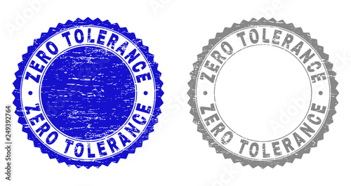 Grunge ZERO TOLERANCE stamp seals isolated on a white background. Rosette seals with grunge texture in blue and grey colors. Vector rubber stamp imprint of ZERO TOLERANCE label inside round rosette.