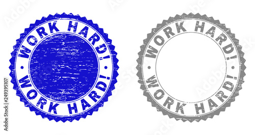Grunge WORK HARD! stamp seals isolated on a white background. Rosette seals with grunge texture in blue and grey colors. Vector rubber stamp imprint of WORK HARD! label inside round rosette.